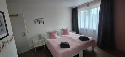 Ein Bett oder Betten in einem Zimmer der Unterkunft Orchidee Altenau