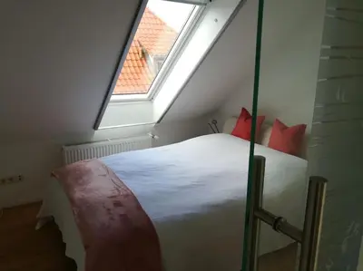 Ein Bett oder Betten in einem Zimmer der Unterkunft Apartment-Studio baubiologisch in Quedlinburg