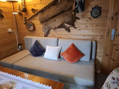 Ein Sitzbereich in der Unterkunft Blockhaus 