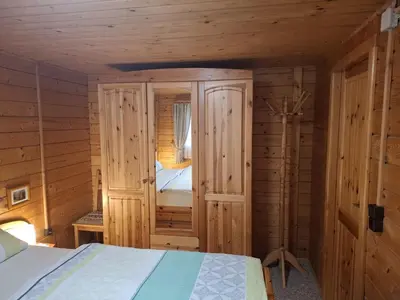 Ein Bett oder Betten in einem Zimmer der Unterkunft Blockhaus 