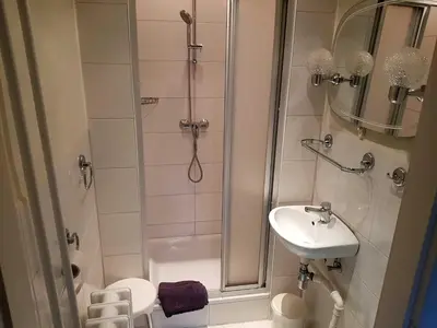 Ein Badezimmer in der Unterkunft Bungalow Weidling