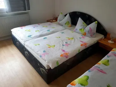 Ein Bett oder Betten in einem Zimmer der Unterkunft Bungalow Weidling