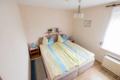 Ein Bett oder Betten in einem Zimmer der Unterkunft Bungalow Krebs