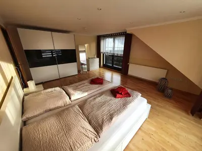 Ein Bett oder Betten in einem Zimmer der Unterkunft Ferienhaus Döring