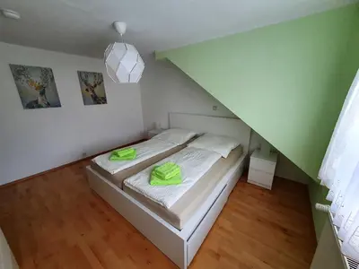 Ein Bett oder Betten in einem Zimmer der Unterkunft Ferienhaus Döring