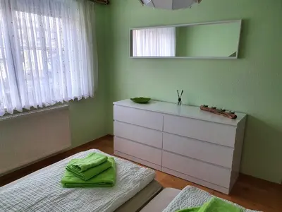 Ein Bett oder Betten in einem Zimmer der Unterkunft Ferienhaus Döring