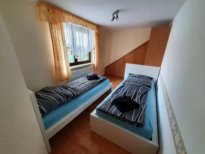 Ein Bett oder Betten in einem Zimmer der Unterkunft Ferienhaus Döring