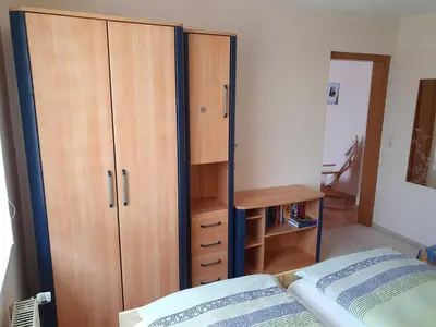 Ein Bett oder Betten in einem Zimmer der Unterkunft Ferienhaus Riemenschneider