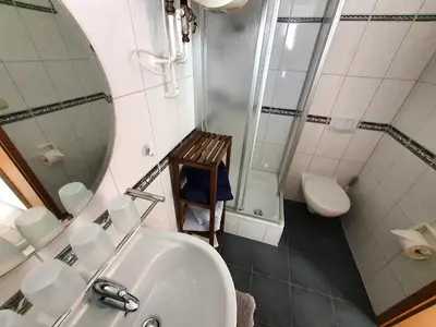 Ein Badezimmer in der Unterkunft Ferienhaus Riemenschneider