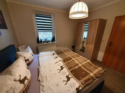 Ein Bett oder Betten in einem Zimmer der Unterkunft Ferienwohnung 