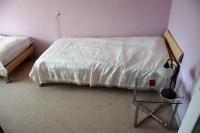 Ein Bett oder Betten in einem Zimmer der Unterkunft Ferienwohnung 
