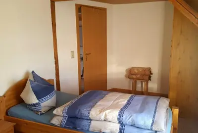 Ein Bett oder Betten in einem Zimmer der Unterkunft Ferienwohnung Nichau