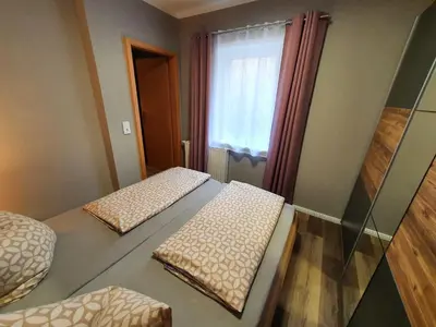 Ein Bett oder Betten in einem Zimmer der Unterkunft Gasthaus 
