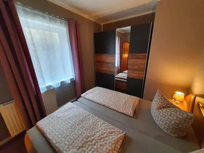 Ein Bett oder Betten in einem Zimmer der Unterkunft Gasthaus 