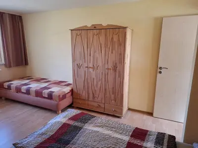 Ein Bett oder Betten in einem Zimmer der Unterkunft Ferienwohnungen Königshof
