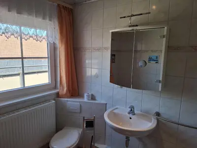 Ein Badezimmer in der Unterkunft Ferienwohnungen Königshof