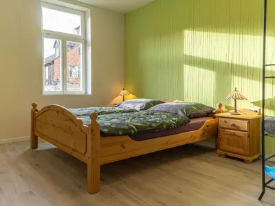 Ein Bett oder Betten in einem Zimmer der Unterkunft Ferienwohnungen Tanner Hütte