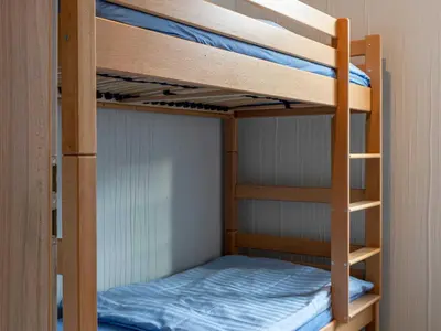 Ein Bett oder Betten in einem Zimmer der Unterkunft Ferienwohnungen Tanner Hütte