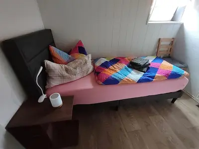 Ein Bett oder Betten in einem Zimmer der Unterkunft Ferienwohnung Schenk