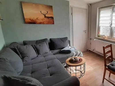 Ein Sitzbereich in der Unterkunft Ferienwohnung Schenk