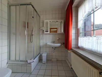 Ein Badezimmer in der Unterkunft Pension Königshof