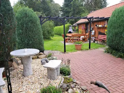 Ein Garten an der Unterkunft Pension Königshof
