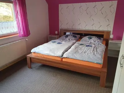 Ein Bett oder Betten in einem Zimmer der Unterkunft Haus Sonja