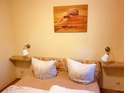 Ein Bett oder Betten in einem Zimmer der Unterkunft Haus Irina & Haus Anna