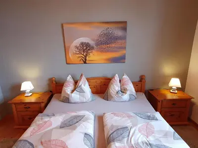 Ein Bett oder Betten in einem Zimmer der Unterkunft Haus Sonnenblick
