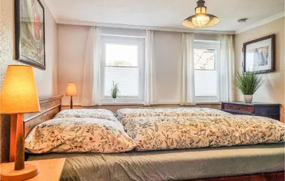Ein Bett oder Betten in einem Zimmer der Unterkunft Nice Apartment In Sankt Andreasberg