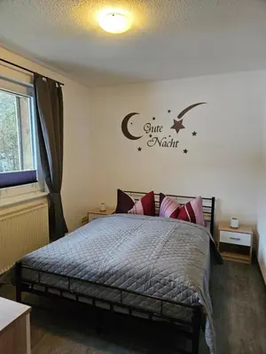 Ein Bett oder Betten in einem Zimmer der Unterkunft Mittel-Schänke Wieda