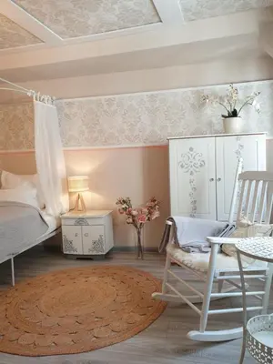Ein Bett oder Betten in einem Zimmer der Unterkunft Stillvolle Designwohnung im historischen Zentrum
