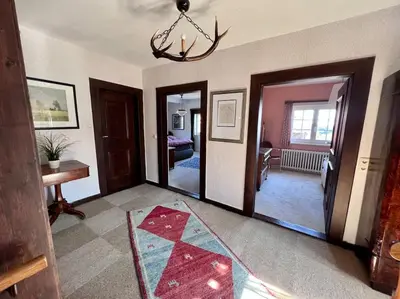 Ein Bett oder Betten in einem Zimmer der Unterkunft Villa Herzog - Ferienhaus für 6 Personen in Braunlage, Harz