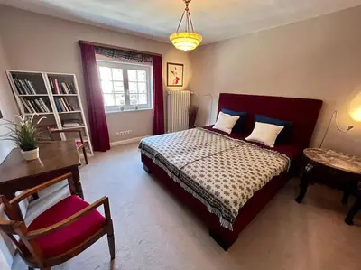 Ein Bett oder Betten in einem Zimmer der Unterkunft Villa Herzog - Ferienhaus für 6 Personen in Braunlage, Harz