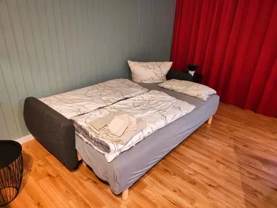 Ein Bett oder Betten in einem Zimmer der Unterkunft Apartment Harzfeuer mit wunderbarem Ausblick und Schwimmbad