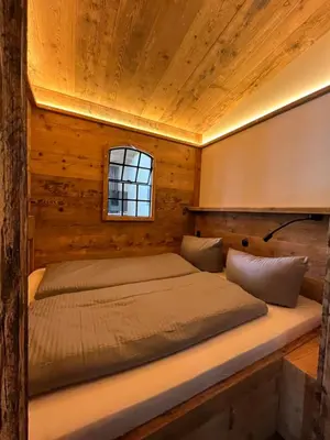 Ein Bett oder Betten in einem Zimmer der Unterkunft BERGLAGE - Das UrlaubZuhause - Ferienhäuser