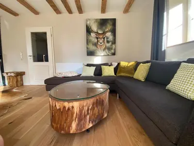 Ein Sitzbereich in der Unterkunft BERGLAGE - Das UrlaubZuhause - Ferienhäuser