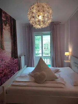 Ein Bett oder Betten in einem Zimmer der Unterkunft Ferienwohnung Benvenuto