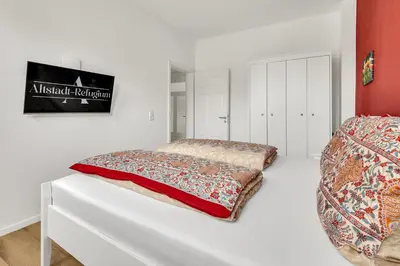 Ein Bett oder Betten in einem Zimmer der Unterkunft Altstadt-Refugium Goslar