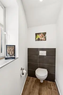 Ein Badezimmer in der Unterkunft HarzLounge - Wanderauszeit zu viert mit Garten