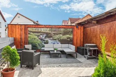 Ein Sitzbereich in der Unterkunft HarzLounge - Wanderauszeit zu viert mit Garten