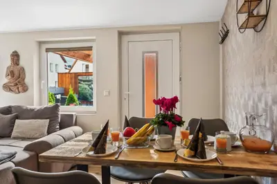 Ein Sitzbereich in der Unterkunft HarzLounge - Wanderauszeit zu viert mit Garten