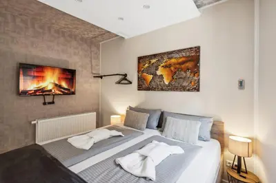 Ein Bett oder Betten in einem Zimmer der Unterkunft HarzLounge - Wanderauszeit zu viert mit Garten