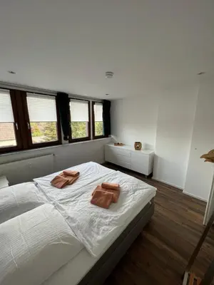 Ein Bett oder Betten in einem Zimmer der Unterkunft Appartementhaus Silberborn