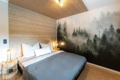 Ein Bett oder Betten in einem Zimmer der Unterkunft Waldbewohner Apartments / Fuchs