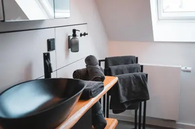 Ein Sitzbereich in der Unterkunft Waldbewohner Apartments / Fuchs