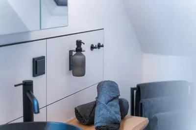 Ein Sitzbereich in der Unterkunft Waldbewohner Apartments / Fuchs