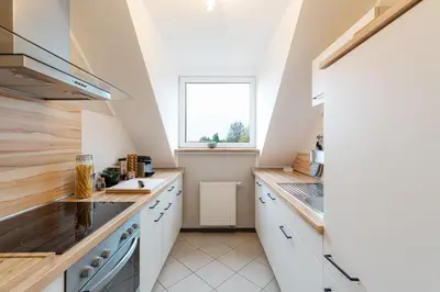 Küche/Küchenzeile in der Unterkunft Waldbewohner Apartments / Fuchs
