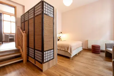 Ein Bett oder Betten in einem Zimmer der Unterkunft Salon am Schlossberg