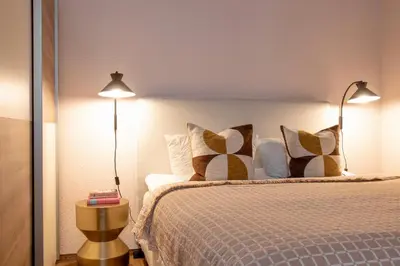 Ein Bett oder Betten in einem Zimmer der Unterkunft Salon am Schlossberg